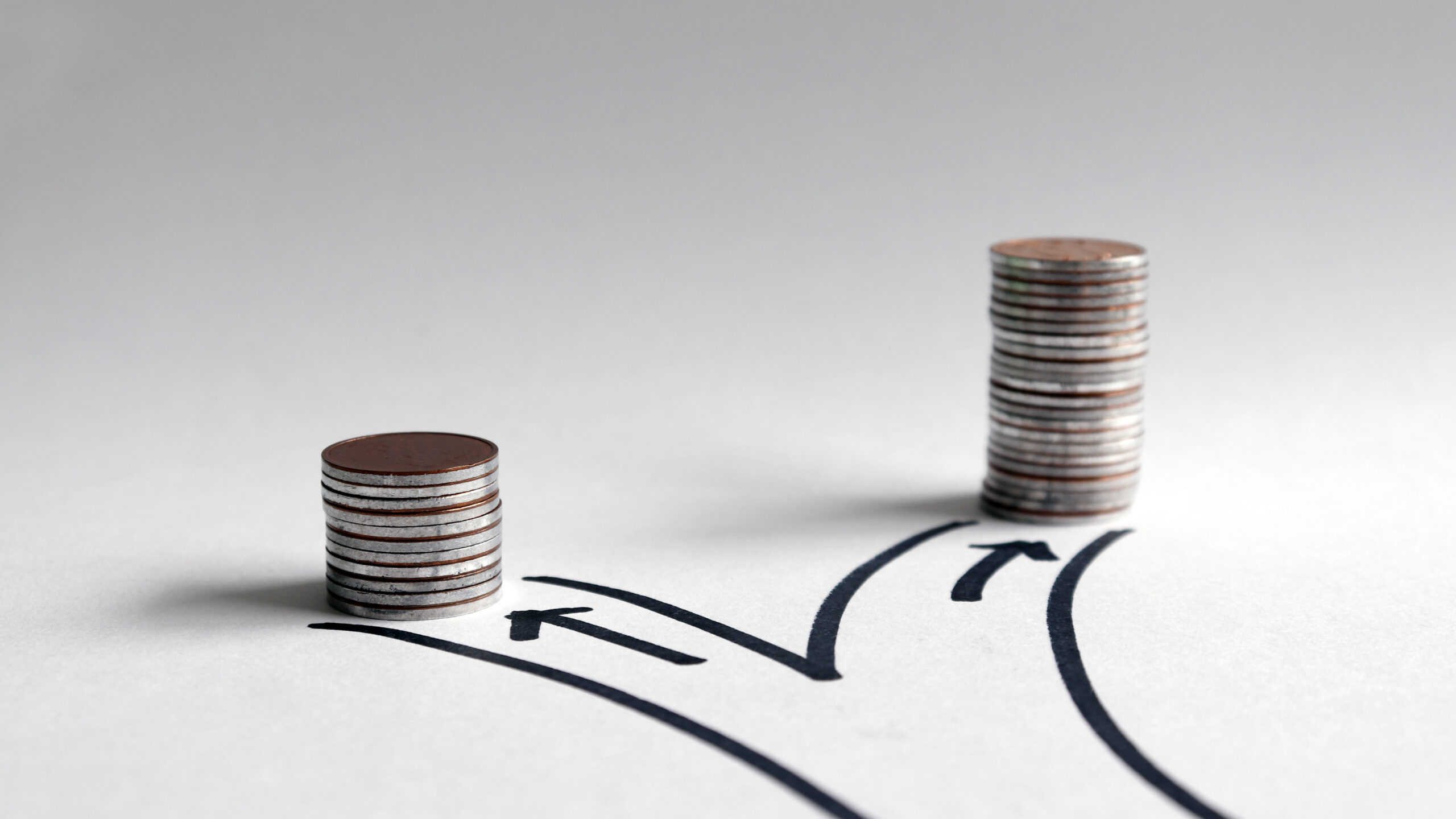 i3solutions logo and branding | i3solutions I3solutions logo with stacked coins representing financial growth.