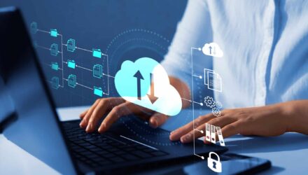 Cloud Data Management and Migration Solutions | i3solutions Cloud data management and migration icons with a person using a laptop.