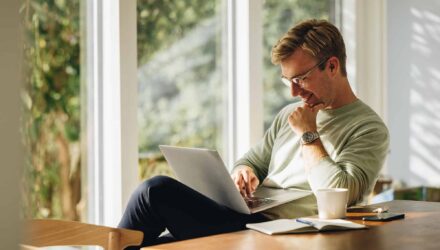 Excel vs Power Platform: Smarter Business Solutions | i3solutions Business professional using laptop for Excel and Power Platform comparison.