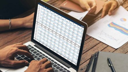 Modern spreadsheet on laptop showing data analysis for business growth.