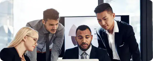 Business Team Collaborating in Office | i3solutions Enterprise IT leaders collaborating on Azure cloud strategy for complex environments.