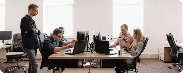 Team Collaboration in Modern Office | i3solutions Enterprise team developing AI-powered copilots using Microsoft Copilot Studio.