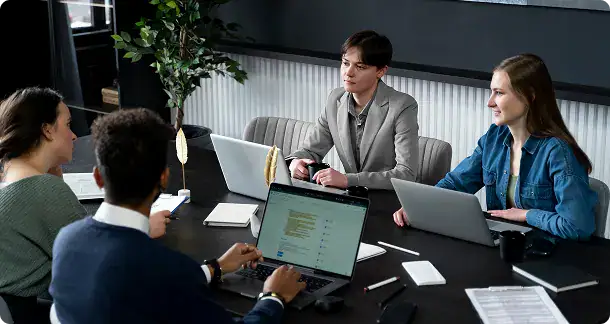 Business Meeting at i3solutions Office | i3solutions Enterprise team collaborating on SharePoint integration, workflow automation, and Microsoft platform architecture planning.
