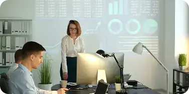 Professional Business Meeting in Modern Office | i3solutions Business leaders planning scalable Microsoft architecture for long-term enterprise growth.