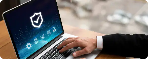Cybersecurity and Data Protection Solutions | i3solutions Employees working securely across devices with Microsoft Copilot-enabled workflows.