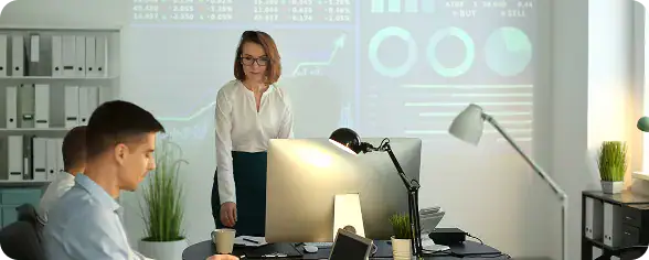 Business Meeting in Modern Office | i3solutions IT team configuring business rules and automated workflows within Microsoft Dataverse.