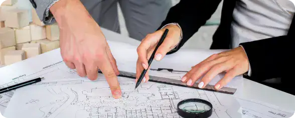 i3solutions Business Planning Meeting | i3solutions Consultants reviewing architecture plans for a Microsoft Power Pages portal implementation.