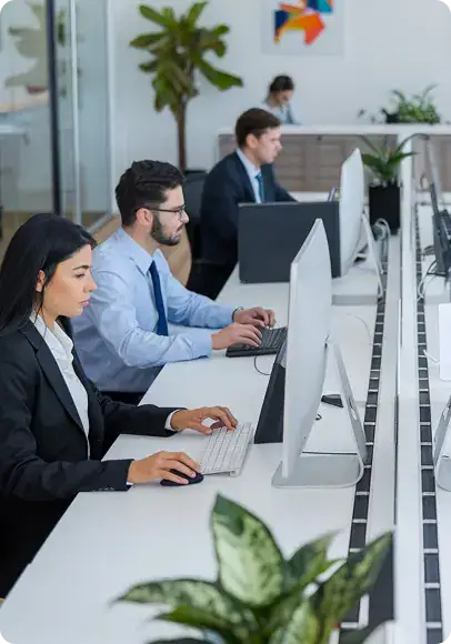 Modern Office Workspace with Employees | i3solutions Enterprise team managing Power Platform governance, security, compliance, and controlled environments.
