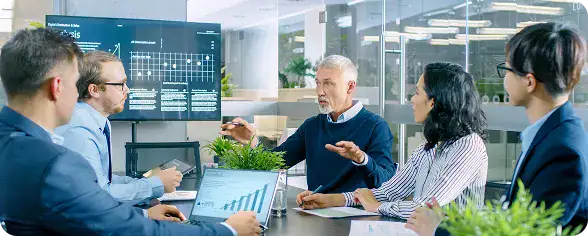 Business Meeting with Data Presentation | i3solutions Enterprise SharePoint architects leading discovery and solution architecture planning session.