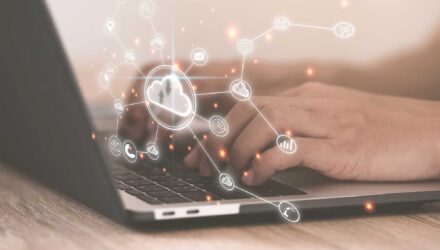 Innovative Cloud Computing Solutions | i3solutions Modern cloud computing and data management technology on a laptop.