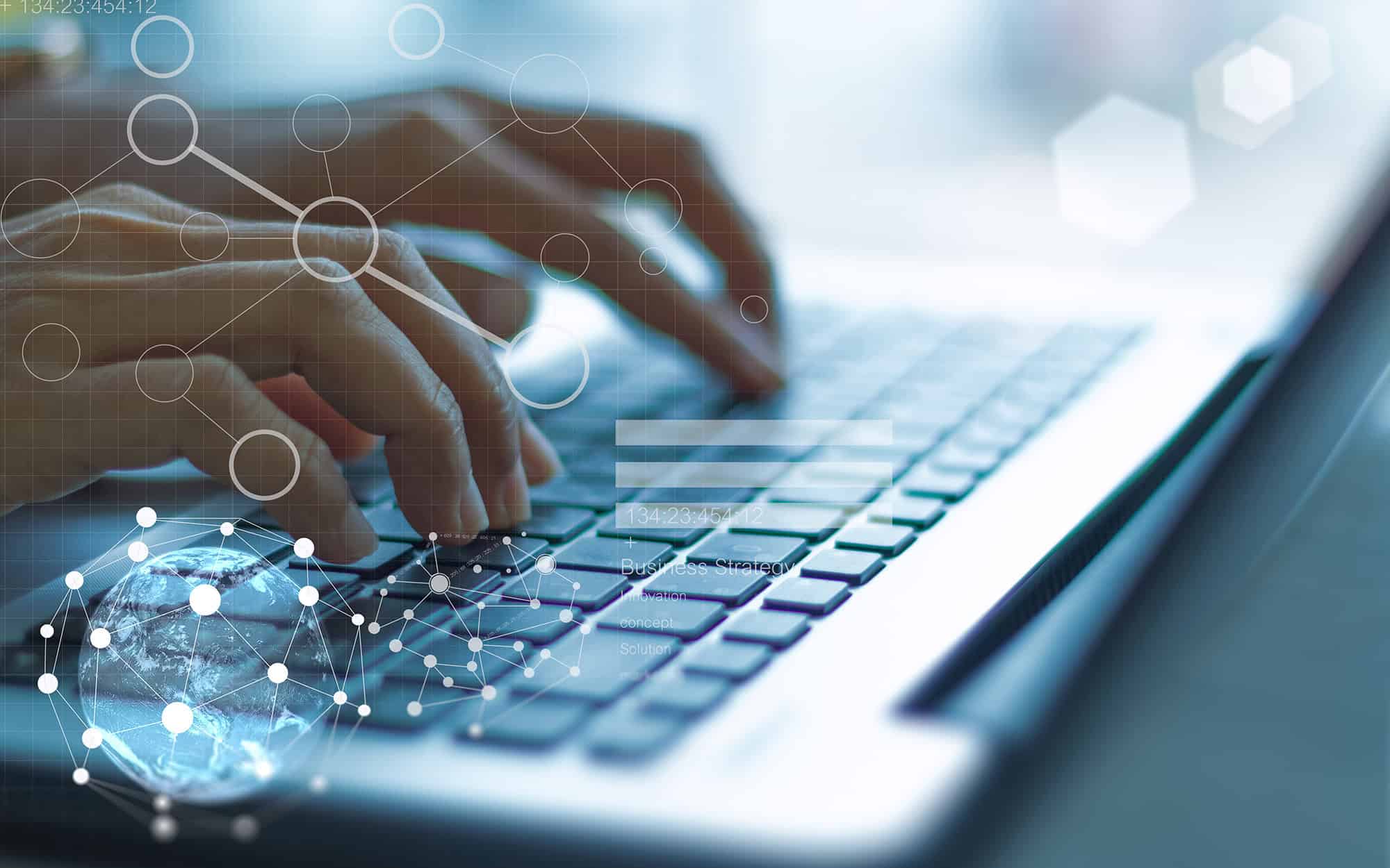 Innovative Tech Solutions | i3solutions Hands typing on a laptop keyboard with digital network graphics overlay.