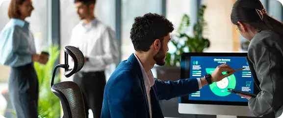 Business Meeting with Data Presentation | i3solutions Solution design and integration that connects Dynamics 365 with ERP and core systems using governed, secure data flows.