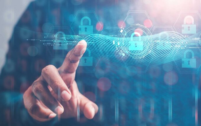 cybersecurity concept Business man shows how to protect cyber technology