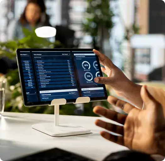 Business Data Dashboard on Tablet | i3solutions Enterprise cost optimization dashboard analyzing Azure integration services, API usage, and licensing consumption.