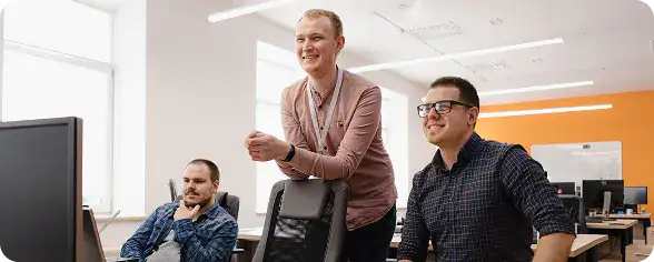 Team Collaboration in Modern Office | i3solutions IT team focused on strategic work after reducing overhead and complexity through centralized system integration.