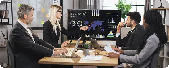 Business Meeting with Data Presentation | i3solutions Enterprise team reviewing secure Microsoft Fabric dashboards with governance and compliance controls.