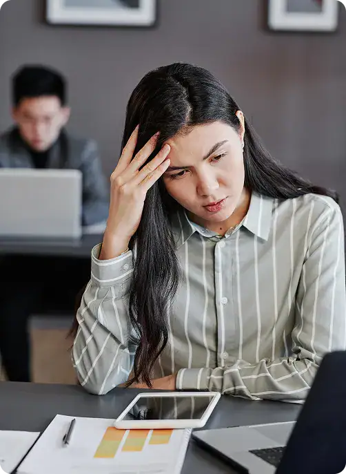 Employee stressed over SharePoint issues | i3solutions Enterprise SharePoint deployment decisions often fail without governance, change control, and compliance alignment.