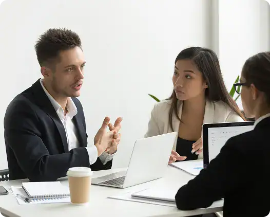 Business Meeting at i3solutions Office | i3solutions Enterprise impact of ungoverned application environments on execution speed, operational cost, risk exposure, and decision velocity