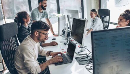 Remote and on-site teams collaborating on Microsoft-centric enterprise projects.