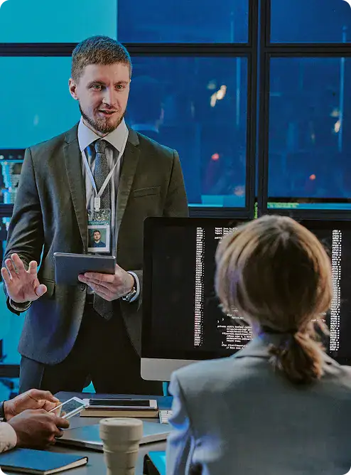 Digital Transformation Consulting Meeting | i3solutions Senior consultant presenting digital transformation strategy and roadmap to enterprise leadership, covering cloud modernization, automation, and AI readiness.