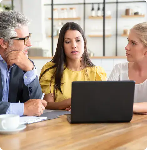 Team Discussing Identity Access Management | i3solutions Enterprise IAM initiatives break down when identity is implemented without governance, entitlement control, operating-model alignment, and access rationalization.