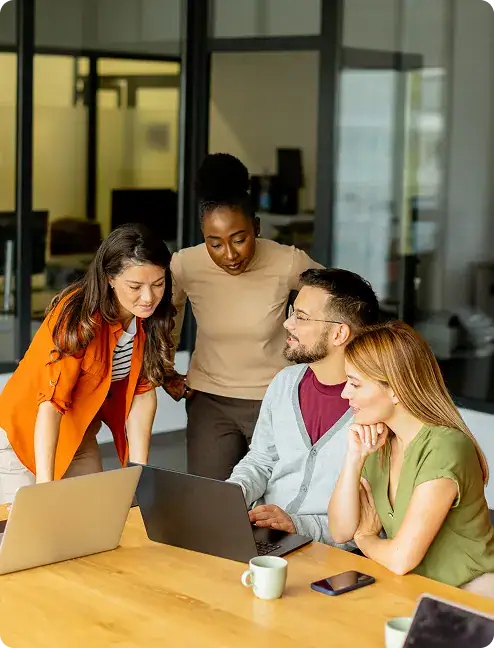 Team Collaborating on Workflow Automation | i3solutions Enterprise team evaluating governed workflow automation outcomes across business operations