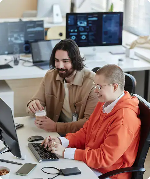 Governance & Compliance Solutions Team | i3solutions IT governance consultants evaluating enterprise platform governance and compliance requirements at a workstation