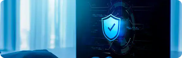 Cybersecurity Shield with Digital Interface | i3solutions Cybersecurity concept: a glowing shield with a checkmark displayed on a high-tech screen, symbolizing online protection and data security.
