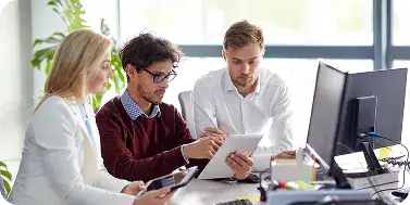 Team Collaborating on Power Platform Project | i3solutions Embedded Power Platform engineers working alongside an internal enterprise team