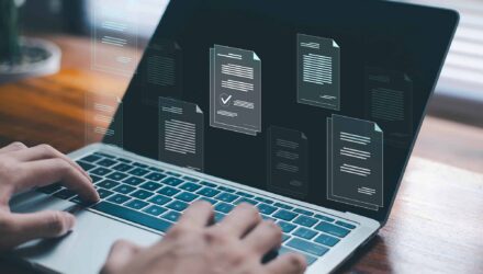 Digital documents and collaboration on a laptop screen.