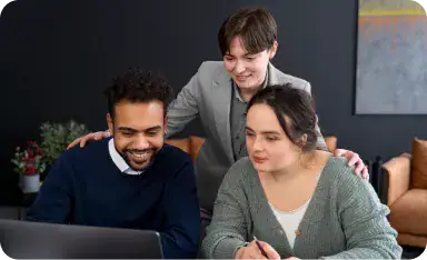 Team Collaborating on Microsoft Dynamics 365 | i3solutions Team working together on Microsoft Dynamics 365 project in office.