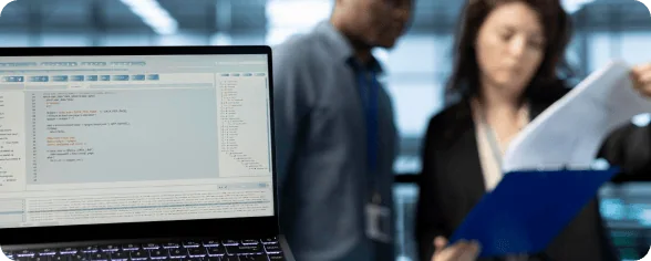 Enterprise Migration Services Team Collaboration | i3solutions IT professionals discussing enterprise migration strategies in an office.