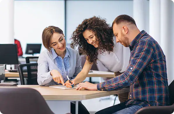Collaborative Team Meeting in Office | i3solutions Senior Power Automate specialists collaborating on enterprise workflow architecture and delivery