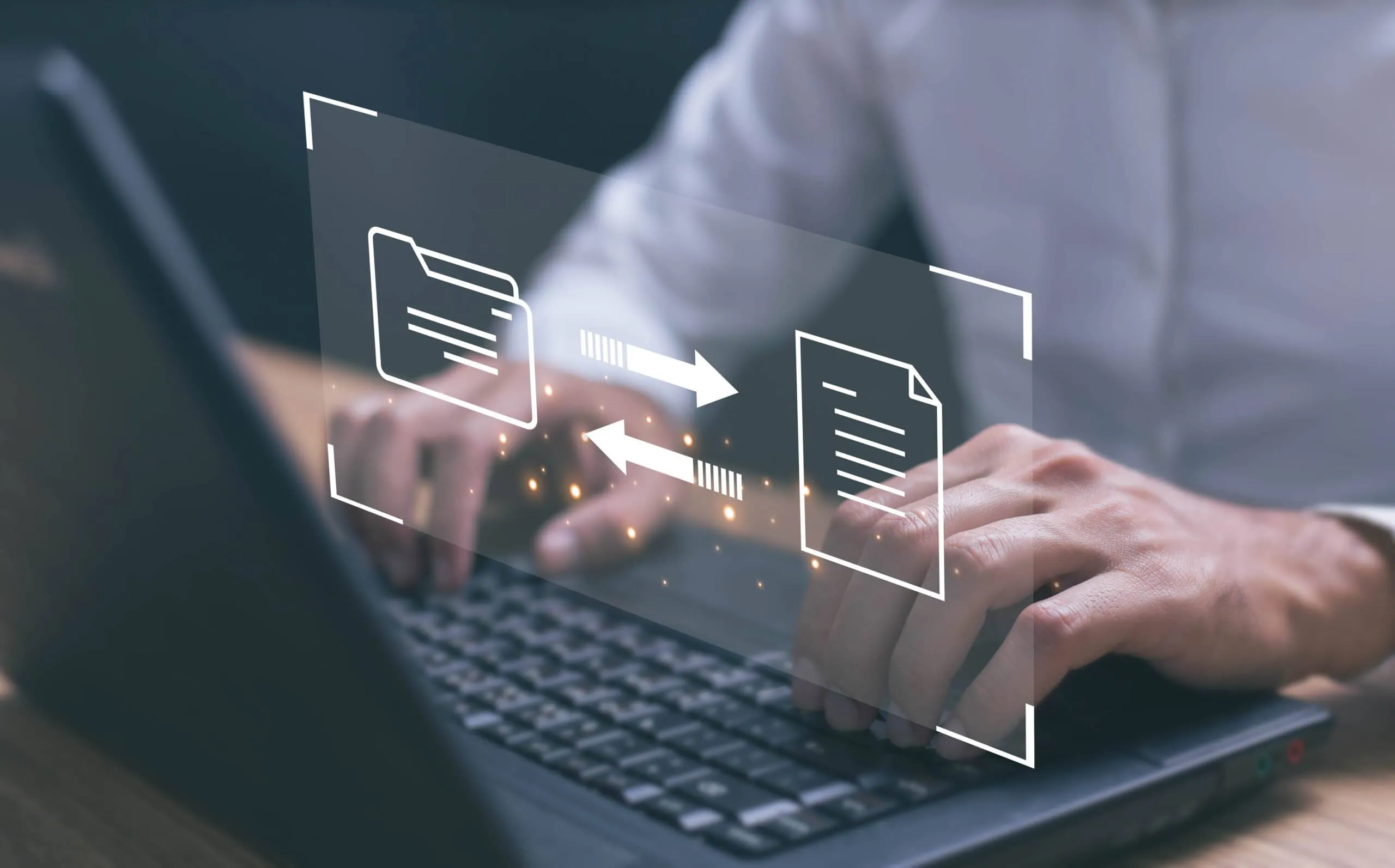 Digital file transfer and document management concept on a laptop screen.