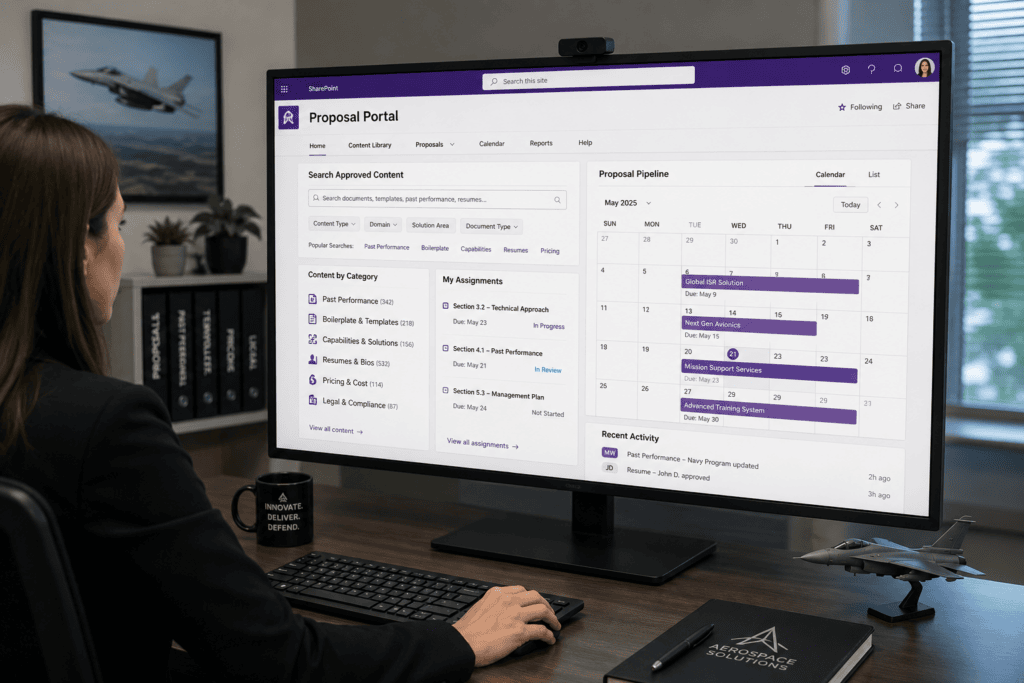 Business professional reviewing a request form on a desktop monitor in an office.