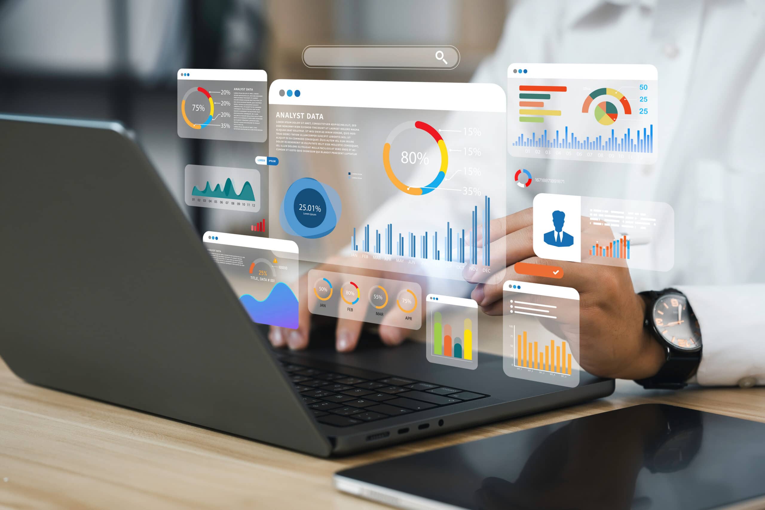 Business Analyst Working with Digital Data Dashboards | i3solutions Business analyst working with digital data dashboards on a laptop.