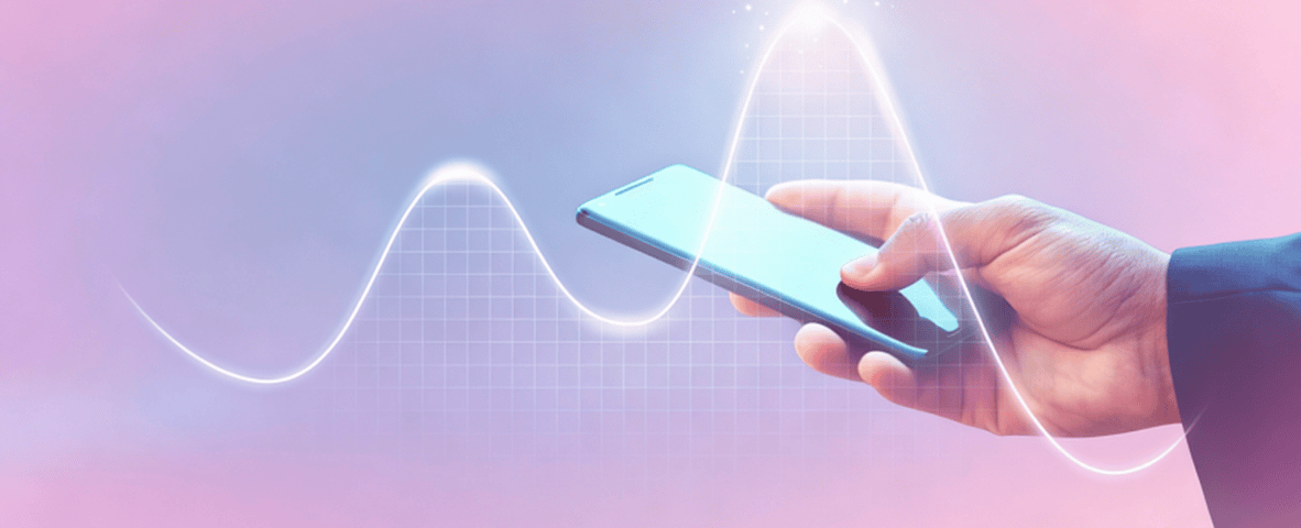 Digital Technology and Data Connectivity Person holding smartphone with digital wave graphics for technology and connectivity.